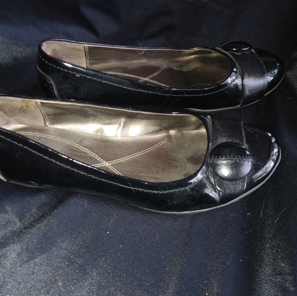Shiny black flats
